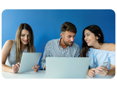 Group work with computers and people talking.
