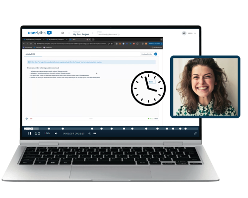 A laptop and a webcam window showing a woman smiling while working in userlytics